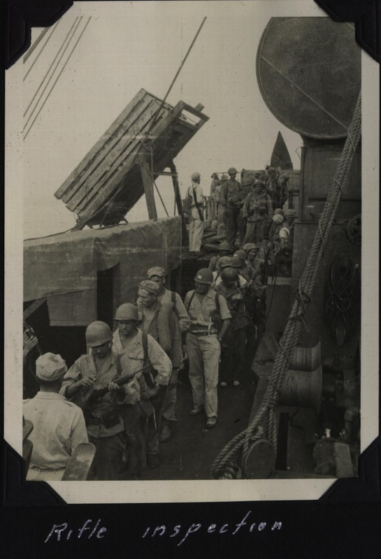 WWII Voyage to Manila rifle inspection