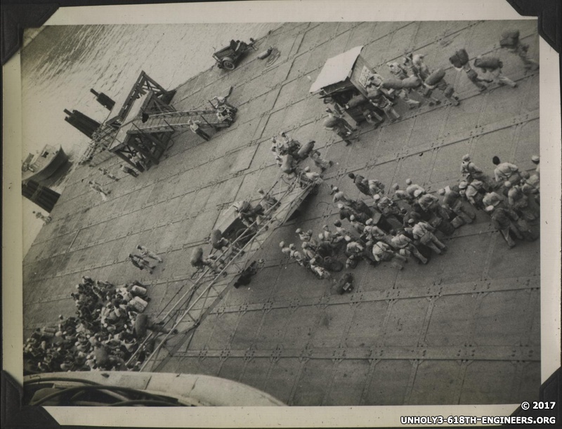 WWII PI Going home people on pier