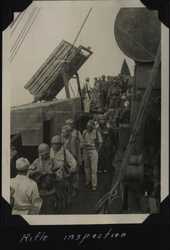 WWII Voyage to Manila rifle inspection